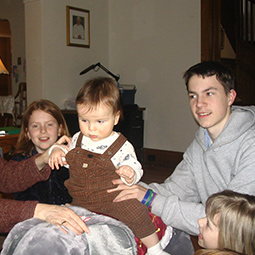 Paula Rankin, Mother with her baby and family in living room