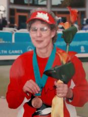 picture of Vivian Berkeley with a medal on holding equipment 
