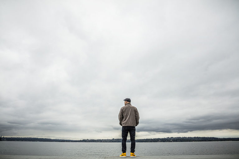 Craig Cincotta looks out at the horizon at Lake Washington in Kirkland, Washington.