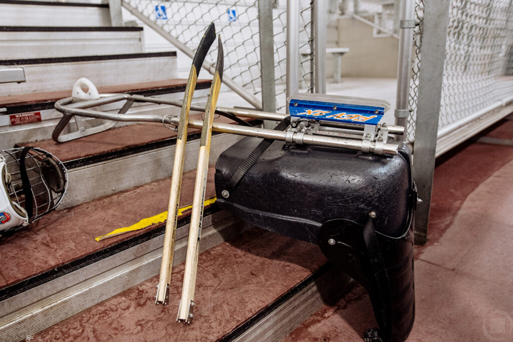 A close up of the sledge they use to play hockey.
