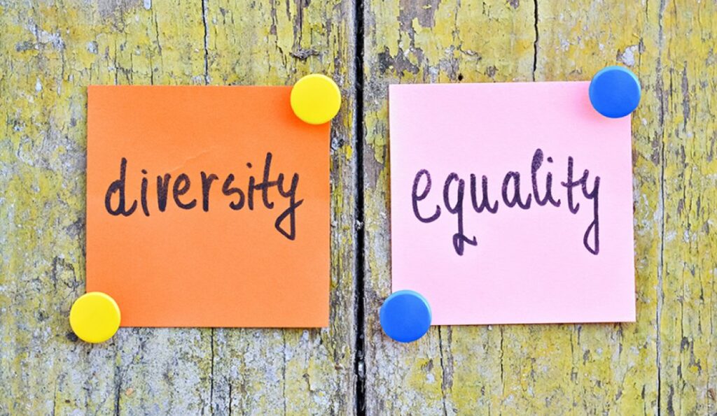 Picture of two sticky notes that say "diversity" and "equality".