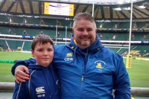 Picture of Chris and his son at Twickenham, the home of English rugby.
