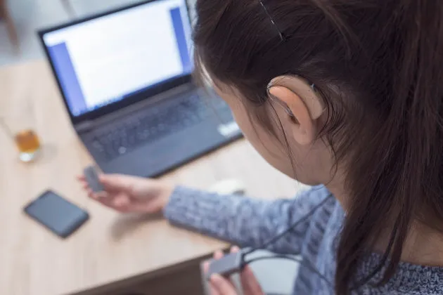 Picture of a girl wearing her hearing aids.