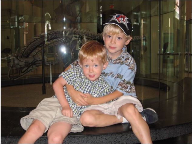 Picture of Jonah (right), age 6, looks after his then-3-year old brother, Ian (left), on a trip to the Museum of Natural History in New York City in 2005.