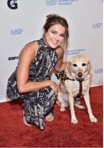 Picture of Becca Meyers and her dog.