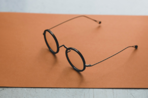 Picture of a pair of glasses on a table.