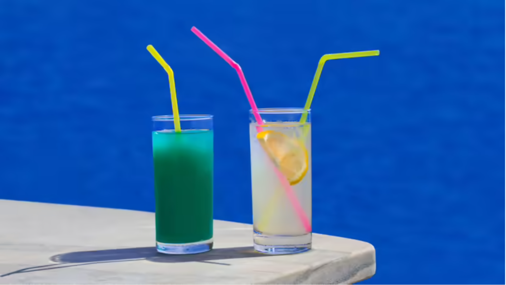 Picture of two cups with bendy straws in them.