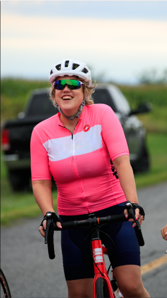 Image of Elle For smiling on a bicycle.