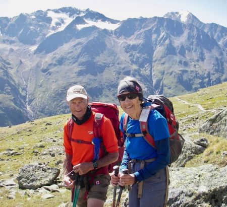 Michael and Isabel wear hiking gear after crossing the Ramoljoch in the Austrian Alps.
